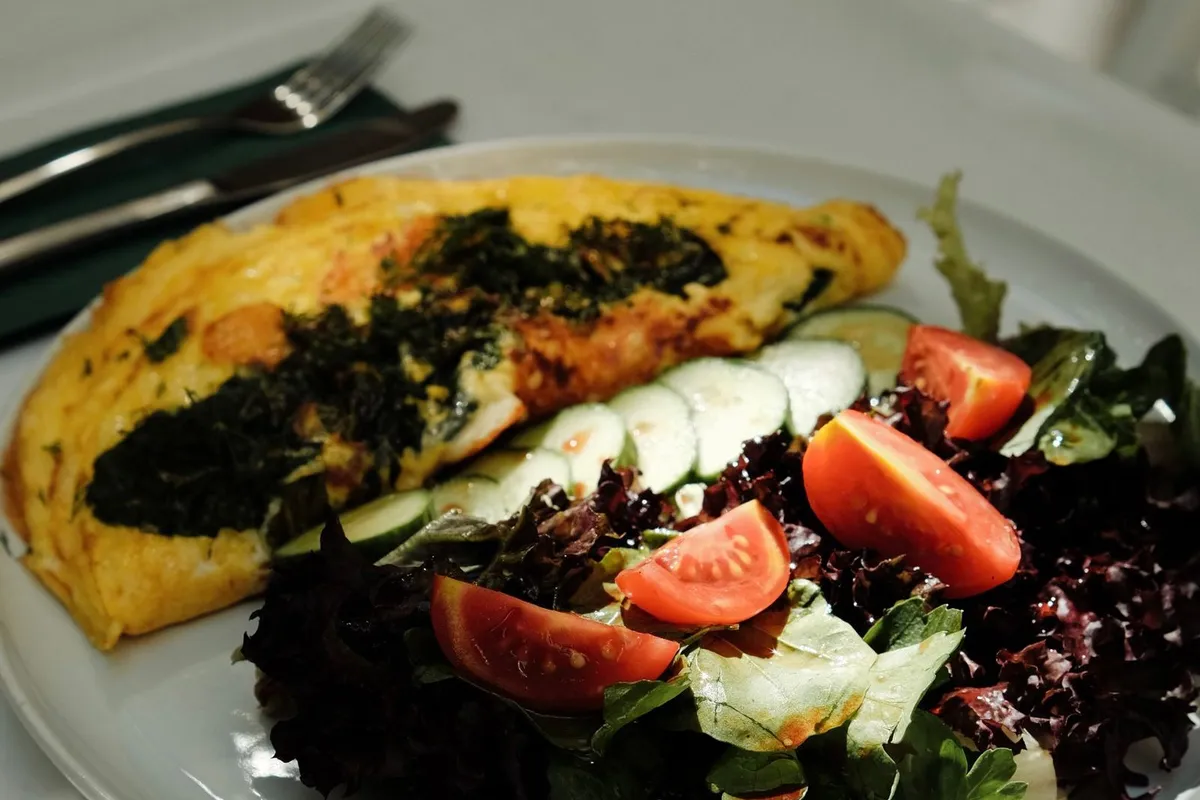 An Indian masala omelette with onion and tomato