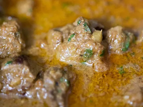 A bowl of soya chunk curry in a spiced gravy