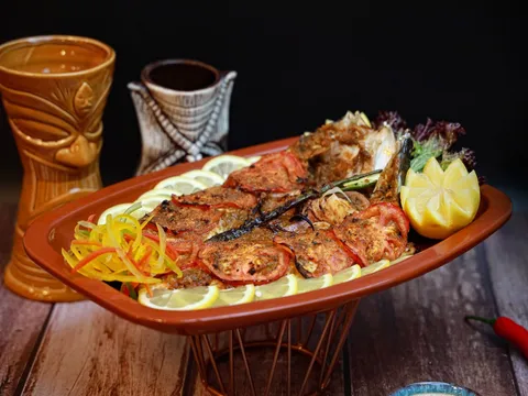 Baked tandoori fish fillets with lemon